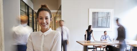 A woman standing in an office