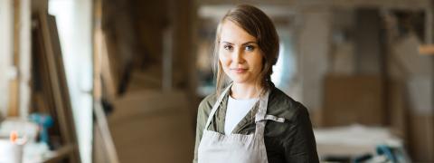 Woman standing in a workshop