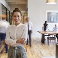 A woman standing in an office