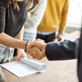 A handshake between a man and a woman