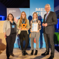 SeedMe founders Natascha Heinrich and Luisa Leinweber receive their price by state secretary Christoph Dammermann