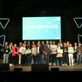 Das war die Demo Night 2023: Gruppenbild der Teilnehmenden in der Gebläsehalle des Landschaftspark Duisburg-Nord