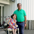 Holger and Petra Strack in front of a building