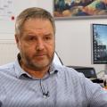 Ulrich Rotte in front of his desk